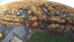 Dodgeville is an older village with mostly older houses.  Here's a shot from 250' up showing the newer, larger houses on the other side of the tracks.  Fall foliage is just starting to fade.... 