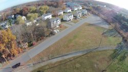 This is a shot from the Hebronville, MA ballfield showing the new houses behind the field with solar panels all over the roofs.  Shot from about 150' up. 