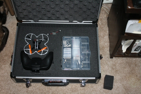 This is a traveling case that holds one hubsan, one transmitter, some batteries, prop guards and a small case full of spare parts.